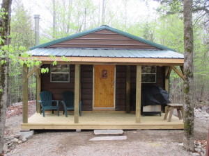 Tiny cabin made from a steel building garage