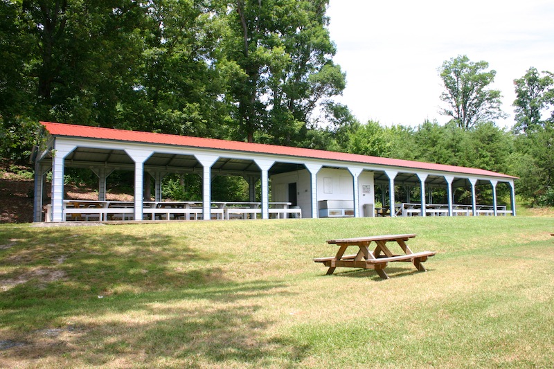 carport seating area with eleven bays