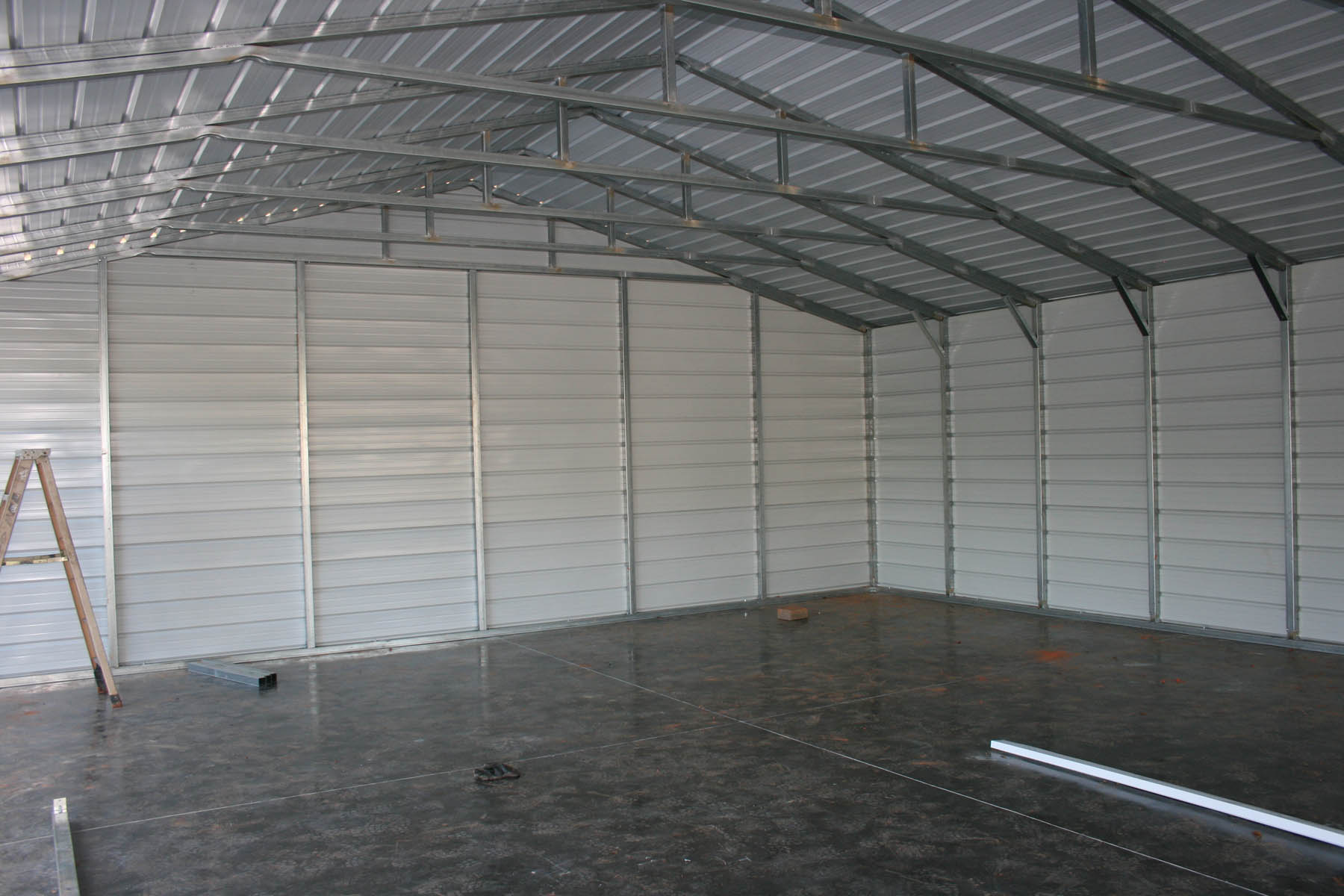 Internal view of a residential garage by steel building garages
