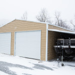 Metal carport used for boat storage used as a ridgeline barn