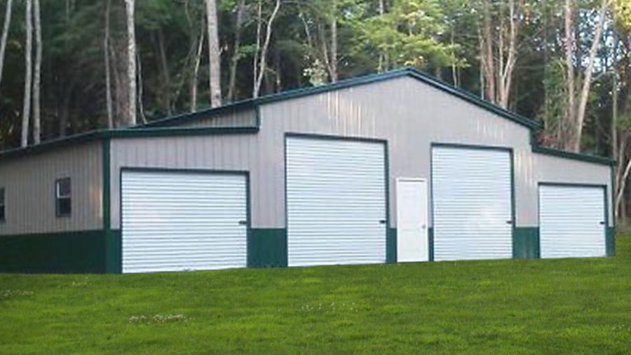 Ridgeline Barn with Wainscoat. Tan and Green metal barn with green trim and metal roofing.