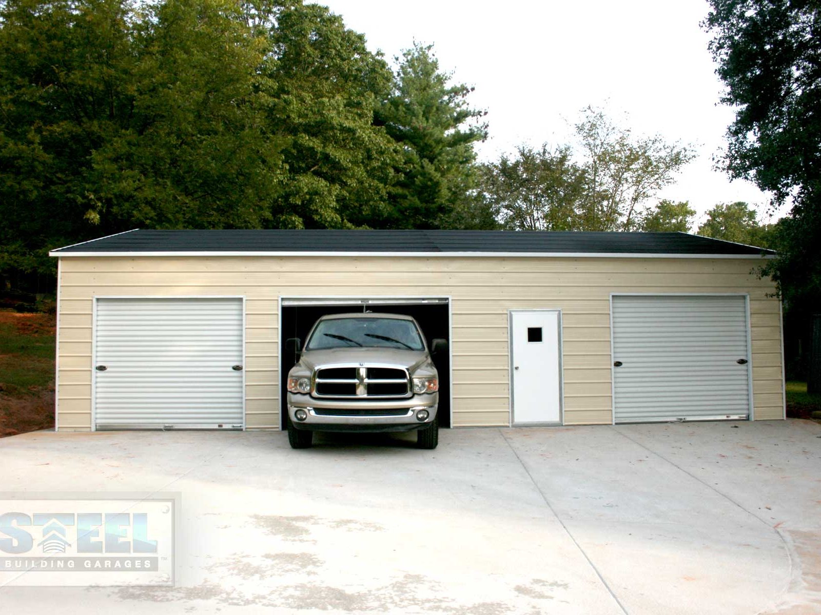 Three car metal garage building.